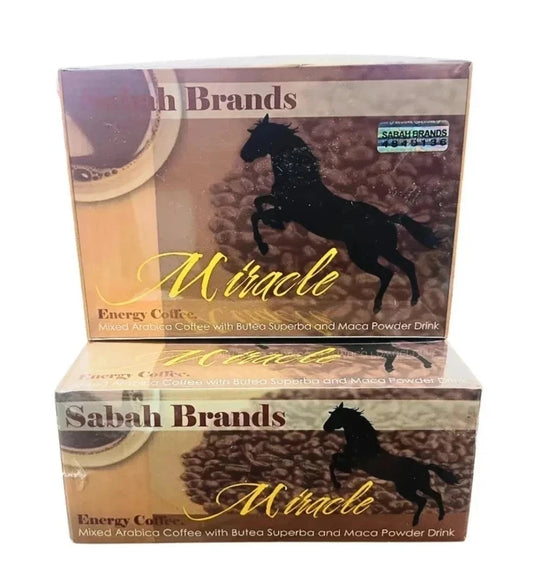 Boxes of Sabah Brands Miracle Energy Coffee stacked on a white background. The packaging features a black horse graphic over a coffee bean texture, with gold script text and brown and beige tones.
